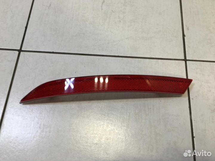 Отражатель в бампер задний левый Volkswagen Passat