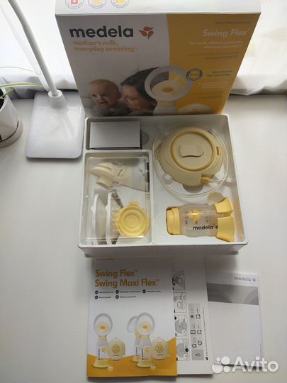Молокоотсос medela swing flex