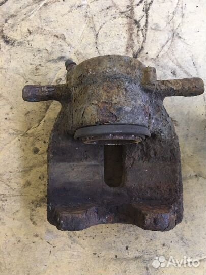 Суппорт тормозной передний Renault Kangoo 2 (2212)