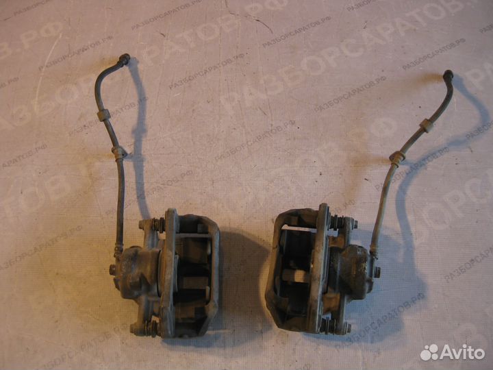 Суппорты тормозные передние Мицубиши Кольт 6