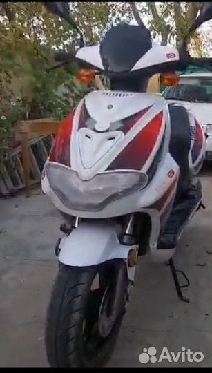 Скутер omaks