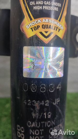 Стойка амортизатора передняя правая Renault Duste