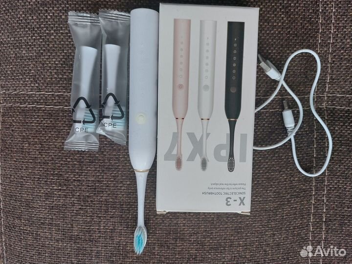 Электронная зубная щетка