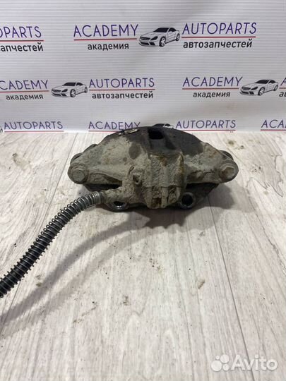 Суппорт тормозной передний левый Peugeot 206