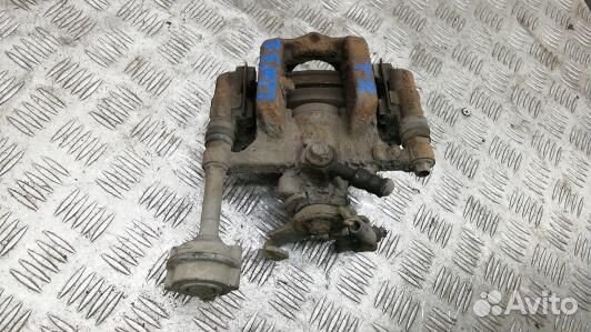 Суппорт тормозной задний левый opel astra J (LDN31