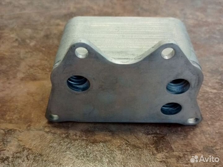 Масляный радиатор 06G117021D