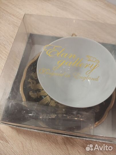 Чашка с блюдцем и ложкой