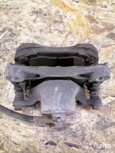 Суппорт тормозной передний Nissan Teana J32 4WD