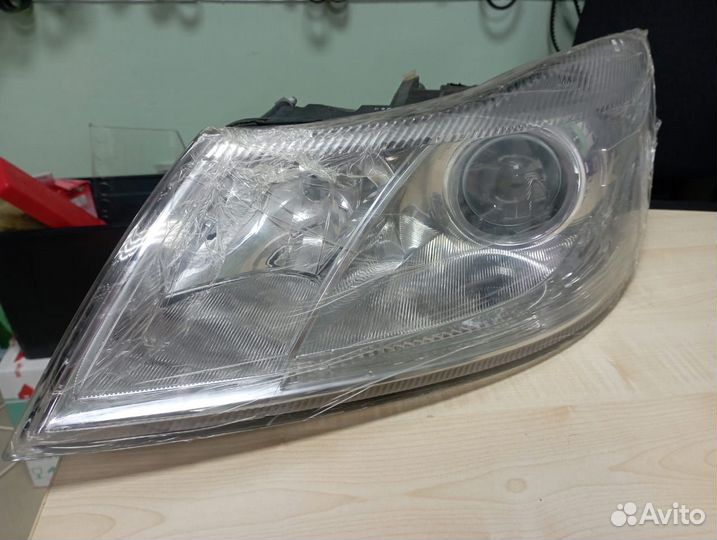 Фара основная левая skoda octavia 09