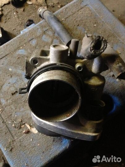 Фольксваген дросельная заслонка 06а133062n