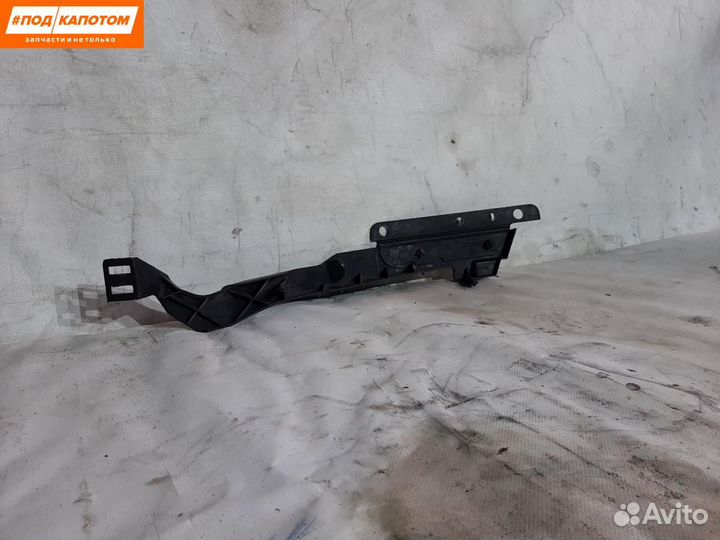Кронштейн крепления бампера переднего правый Ford
