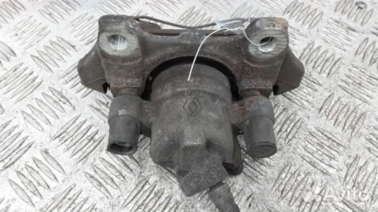 Суппорт тормозной передний левый dacia sandero 2