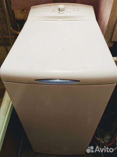 Стиральная машина Whirlpool с вертикальной загрузк