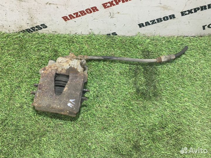 Суппорт тормозной передний левый Skoda Yeti