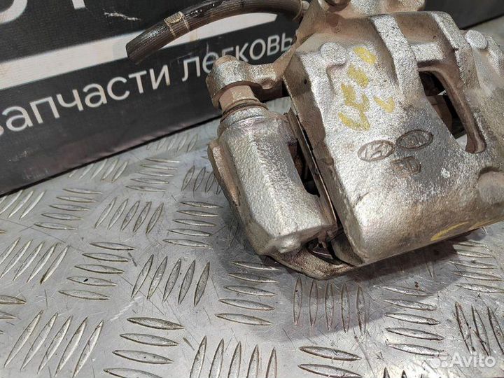 Суппорт тормозной передний левый Kia Ceed ED