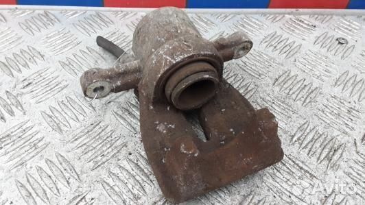 Суппорт тормозной задний левый toyota avensis T25