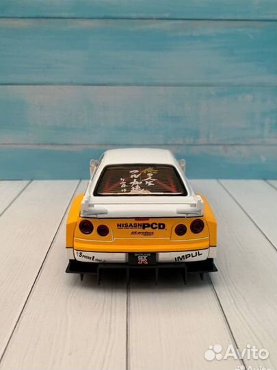 Модель авто Nissan Skyline GT-R R34 lbwk 1:24