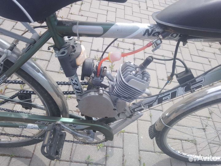 Велосипед stels с мотором 80кубов 2т (торг)