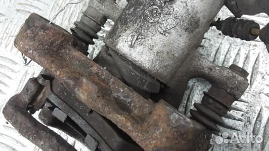 Суппорт тормозной задний правый opel zafira B (UML