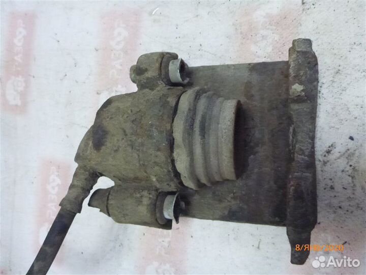 Суппорт передний левый Volkswagen Golf MK2 RF 1988