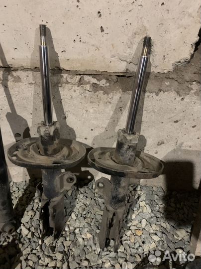 Стойки передние corolla e15