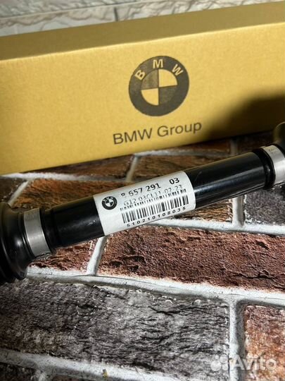 Приводной вал левый BMW 31608657291