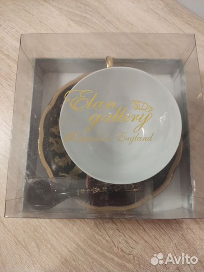 Чашка с блюдцем и ложкой