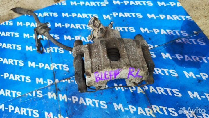 Суппорт задний левый Mazda Axela blefp LF-VD 2010