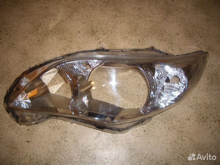 Стекло фары левой Тойота Королла с10-13г