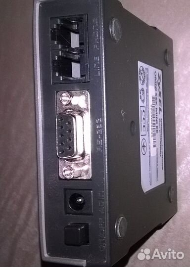 Модем Zyxel Omni 56K mini ее