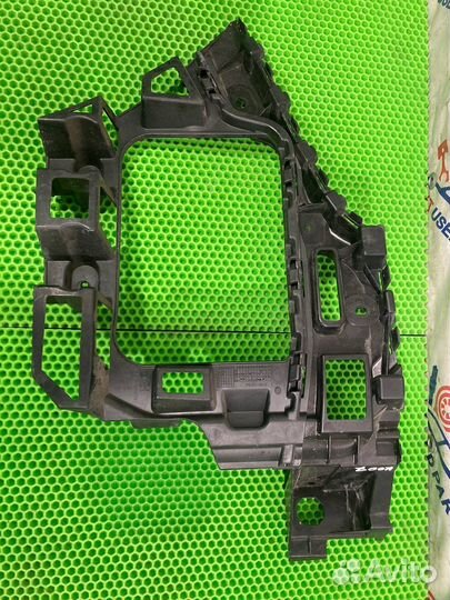 Кронштейн бампера задний левый Volkswagen Touareg