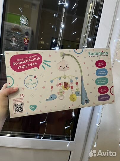 Музыкальная карусель в кроватку
