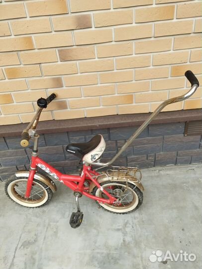 Детский велосипед бу с ручкой