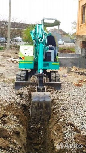 Мини-экскаватор