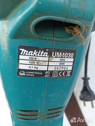 Триммер электрический makita