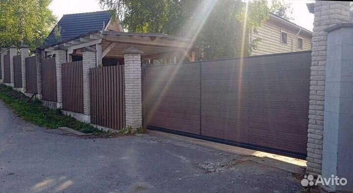 Откатные ворота с врезной калиткой