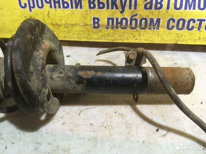 Стойка амортизатора переднего левого Citroen C3 Pi