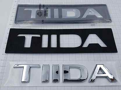 Шильдик надпись на Nissan Tiida