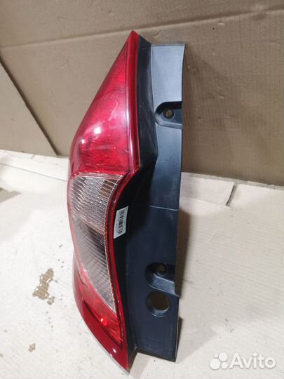 Фонарь левый Nissan Note E12