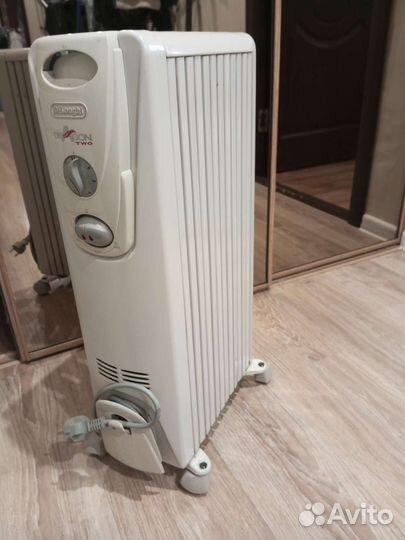 Масляный обогреватель delonghi