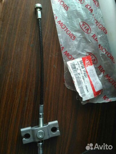 Трос стояночного тормоза Kia Sportage 2