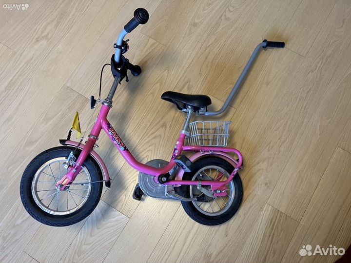 Детский велосипед розовый Puky с ручкой