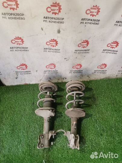 Стойка подвески передняя Nissan Cefiro A32 VQ20