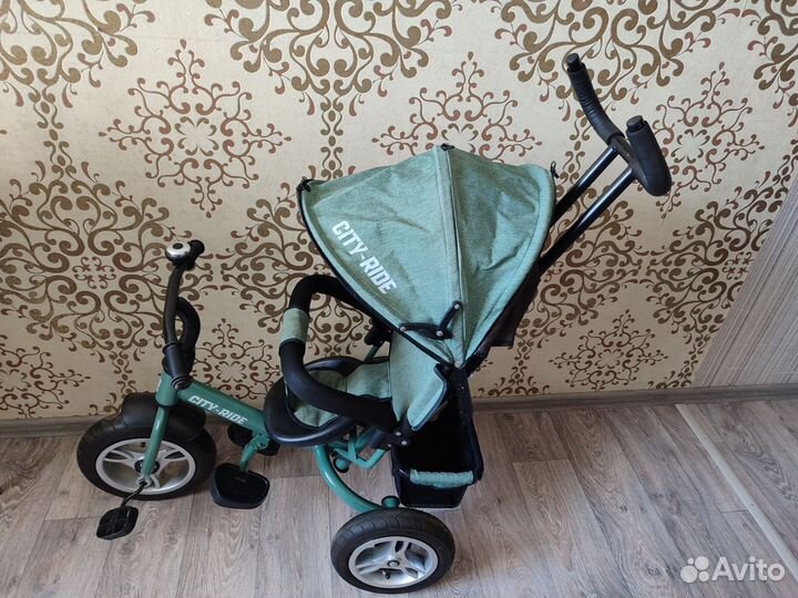 Трехколесный велосипед с ручкой