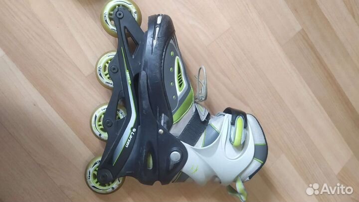 Роликовые коньки