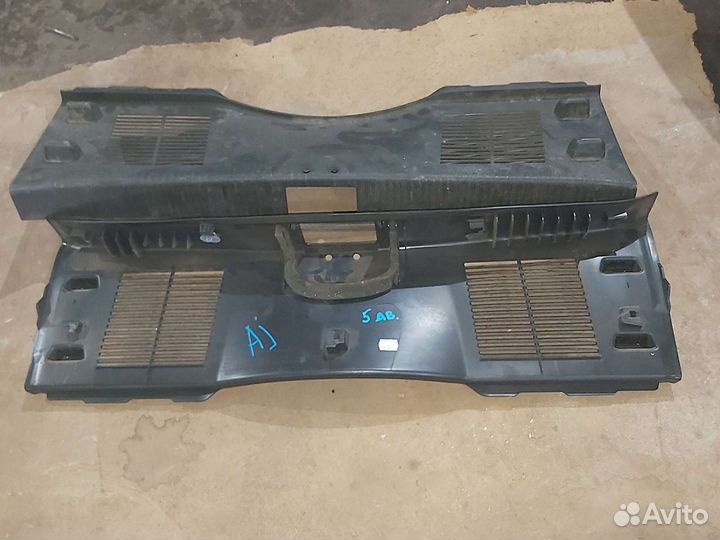 Обшивка багажника Opel Astra J