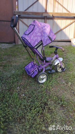 Трехколесный велосипед с ручкой