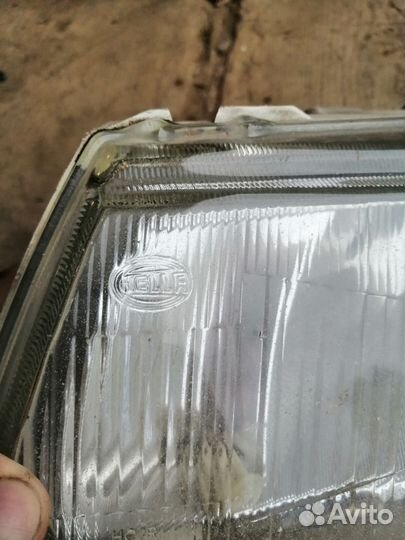 Стекло фары L Митсубиси Каризма