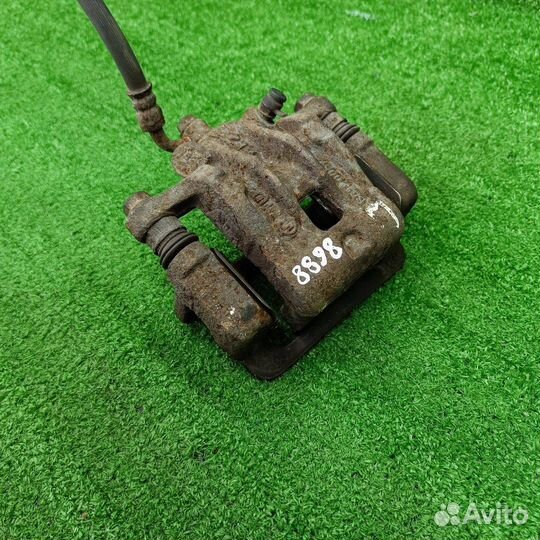 Суппорт тормозной задний правый SsangYong Actyon 2