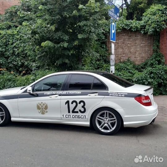 Наклейки на авто, реклама на заднее стекло авто